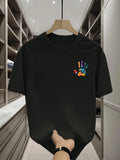 Men's black T-shirt featuring a colorful palm tree print; suitable for parties, nights out, and everyday wear.